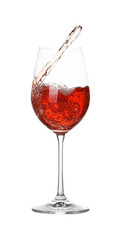 Tasty wine splashing in glass on white background