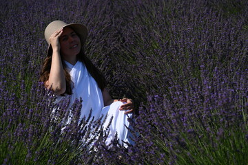 girl in white dress on lavender field,