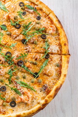 pizza on a wooden board