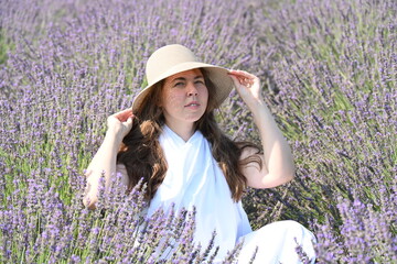 girl in white dress on lavender field,