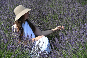 girl in white dress on lavender field,