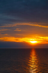 Obraz premium The overcast sky over the Baltic Sea at sunset, Ustronie Morskie, Poland