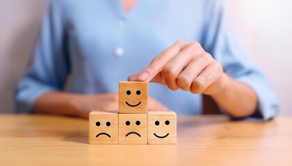 hand with a toy house