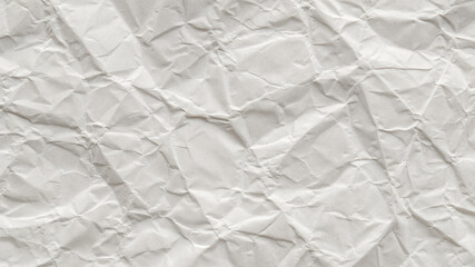 Crumpled white sheet of paper, abstract texture style