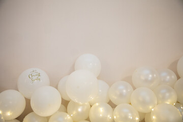 Beautifully designed elegant white balloons adorned with twinkling lights perfect for celebrations