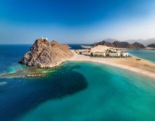 snoopy island in fujairah uae aerial view of the beach with turquoise waters a rocky island and a resort nearby