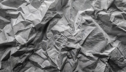 a grey scale abstract texture made using a scan of scrunched and crumpled tissue paper ideal as a background image