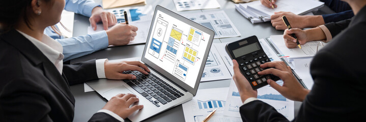 Business intelligence and data analysis concept. Analyst team working on financial data analysis...