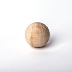 Wooden ball on white background.