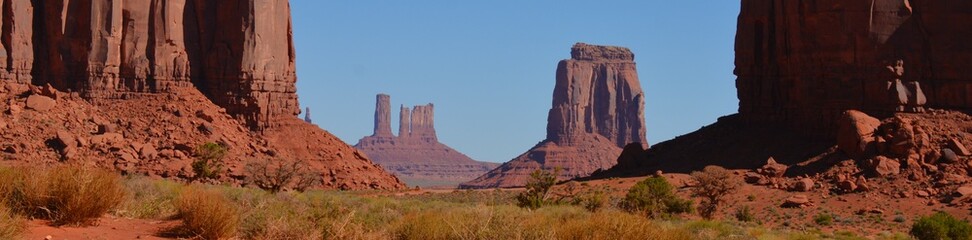 Fototapeta premium Majestic sandstone formations and scenic beauty of Monument Valley, a Navajo Nation Park spanning across Utah and Arizona is world famous. 