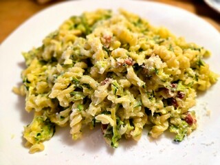 Photo showing pasta with zucchini, mascarpone cheese and freshly grated parmesan.
