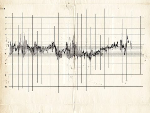 weathered scientific document featuring an old earthquake graph with black waveform signals plotted on faded paper with grid lines

