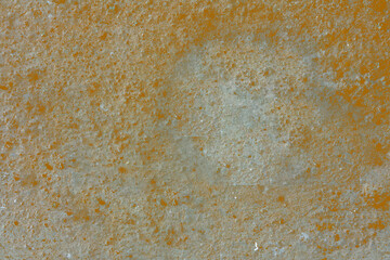 Rusty orange and silver textured surface
