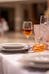 Elegant table setting with wine glass
