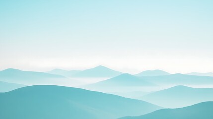 Serene Misty Mountains Under a Pale Sky