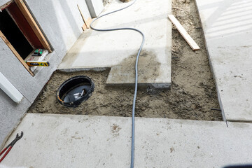 Trench cut in concrete driveway for instillation on new water meter