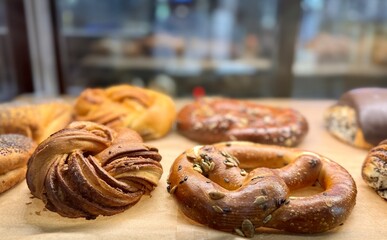 Buns with fresh baked poppy seeds with rich texture and amazing taste on the counter for sale in supermarket