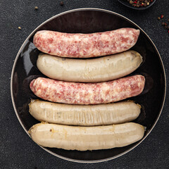 raw sausages pork, beef, chicken, fresh tasty food dish gourmet food background on the table rustic food top view copy space