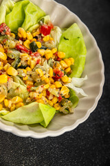 Corn salad vegetables fresh tasty food dish gourmet food background on the table rustic food top view copy space keto and paleo diet Vegetarian and vegan food
