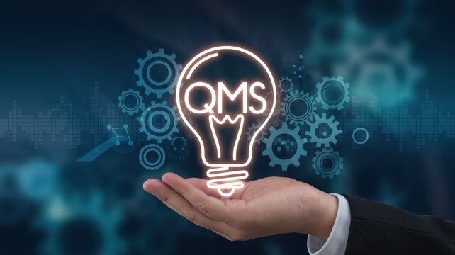 Hand holding glowing lightbulb displaying qms against blue background