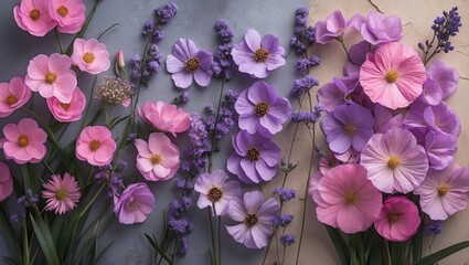 Fototapeta premium Vibrant arrangement of pink and purple flowers on a natural backdrop with ample empty space for text or design elements.