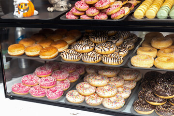 Confectionery shop with colorful donuts for Halloween