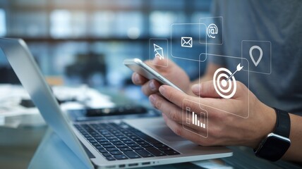 Person using a mobile phone with digital marketing graphics