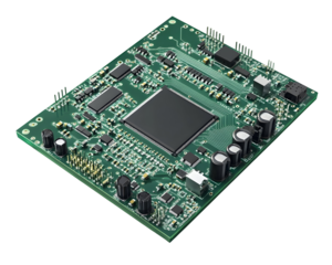 Green circuit board microchip with intricate pathways and soldered components.