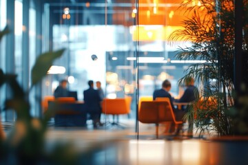 Group of friends or colleagues gathered around a table in a room, possibly for a meeting or socializing