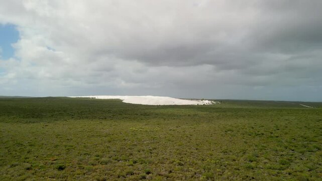 Breathtaking aerial shot of the golden sand dunes at Lancelin, Western Australia