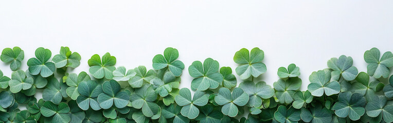 Bright watercolor clover leaves create a festive backdrop for St. Patrick's Day celebrations. Elegant Background for Greeting Text – Perfect for Sales and Marketing
