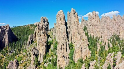 Black Hills mountains and The Needles rock formation, in Custer State Park, South Dakota with slow pull back camera motion