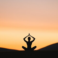 Silhouette of Woman in Yoga Pose at Sunset