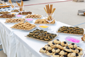 catering wedding buffet with variety of food snacks and appetizers