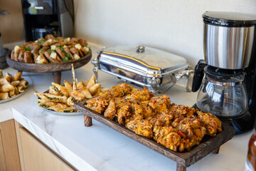 catering buffet with different food snacks and appetizers on table