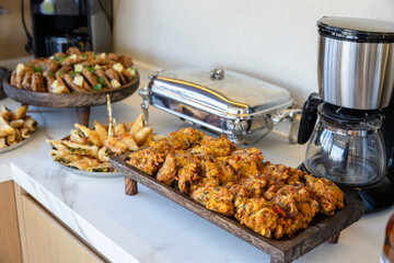 catering buffet with different food snacks and appetizers on table