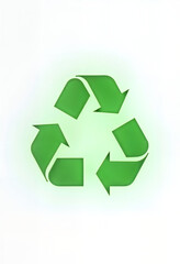 Green leaf shaped like a recycling symbol
