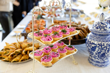 Naklejka premium catering buffet with different food snacks and appetizers on table