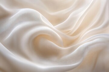 Obraz premium Soft, flowing beige fabric with elegant folds and drapes, creating a luxurious and smooth texture.