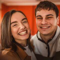 close up of self portrait happy young couple at home