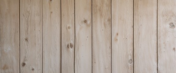 Fototapeta premium a wooden surface, showcasing a rustic and weathered texture. The wood appears to be light beige with subtle variations in tone, indicating natural wear and age.
