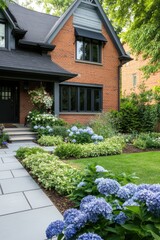 Beautiful suburban home with vibrant hydrangeas and well-maintained garden in a peaceful neighborhood during late spring