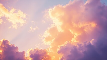 A stunning display of colorful sky during sunset, showcasing soft clouds illuminated in shades of pink, orange, and purple.
