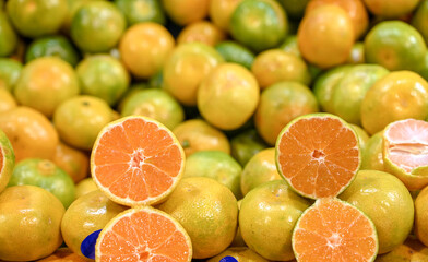 Tangerines for sale in the market. Fresh citrus. Mandarins. 