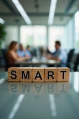 Smart goals wooden cubes reflecting on table in office meeting room