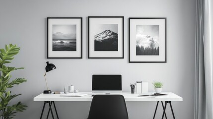 Fototapeta premium Modern minimalist home office workspace with black and white nature prints
