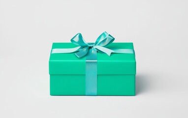Obraz premium Bright Turquoise Gift Box with Ribbon on White Background