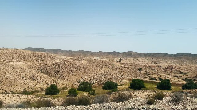 Scenic drive through Tunisian Sahara desert near Matmata Berber village