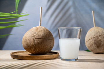 Coconut milk in a drinking glass, diary free plant based vegan milk