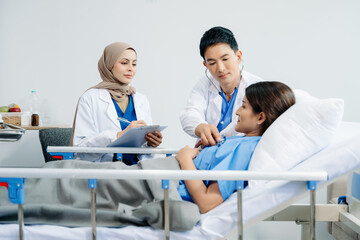 Obraz premium Doctors providing attentive care to a patient in a hospital bed. Compassion, professionalism, and expert healthcare. Ideal for medical